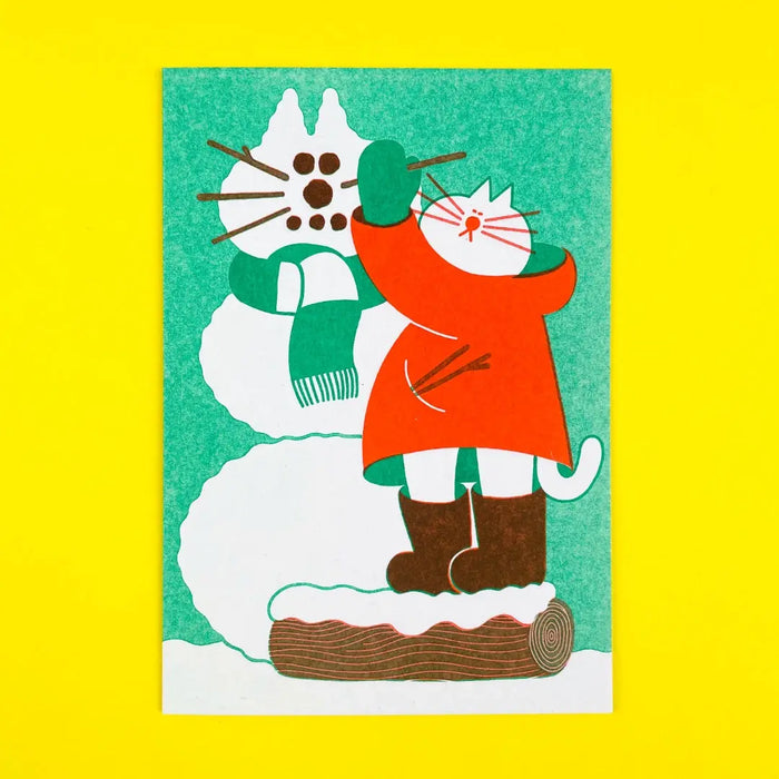 Riso-Klapp-grusskarte-mit-Umschlag-Snow-Cat-Weihnachtskarte-Format-A6-Ansicht-auf-gelen-Hintergrund
