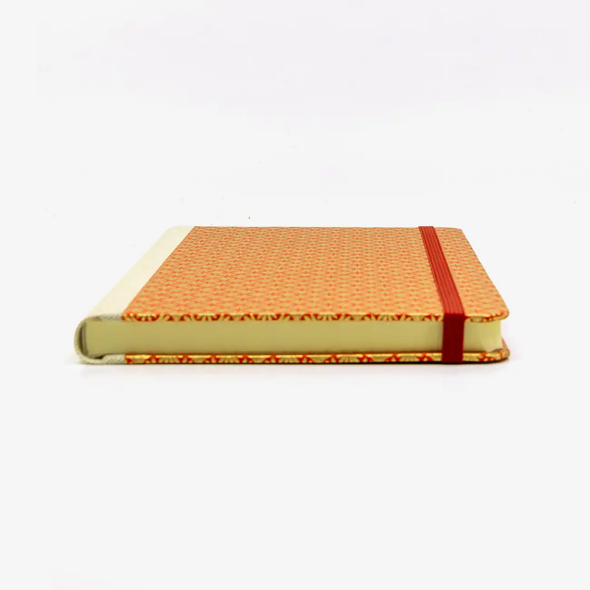 A5-dotted-small-chiyogami-cover-motiv-Ornament-gold-auf-rot-liegend-vorn