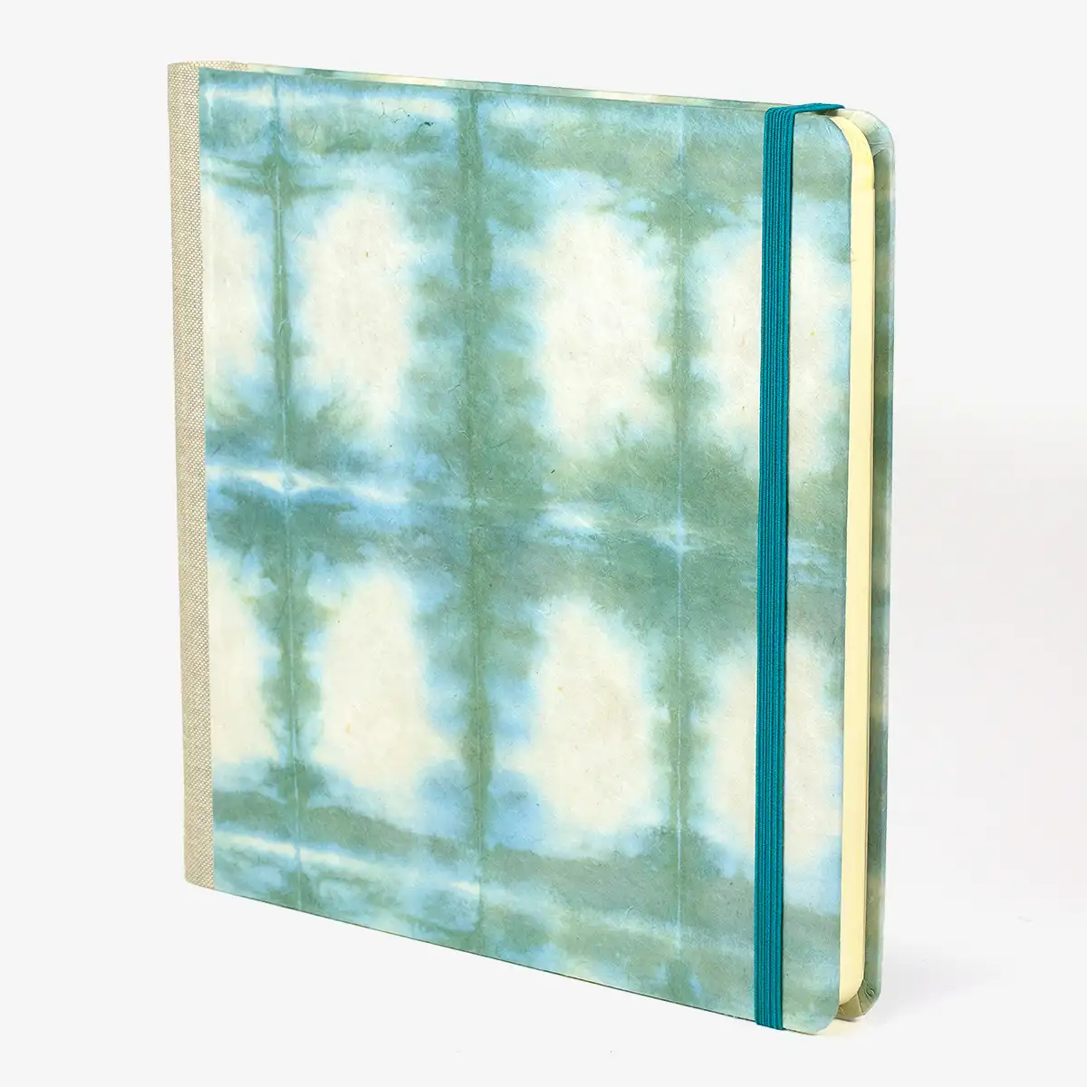 Blaupause-Skizzenbuch-21x21cm-Lineatur-blanko-96-Blatt-bezogen-mit-Loktapapier-spiegelung-gruenblau-Seitlich-Von-vorn