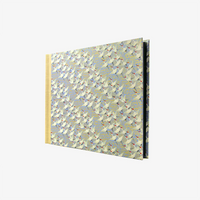 Fotoalbum-24x35cm-60seiten-schwarzer_Fotokarton-mit-chiyogamipapier-bezogen-Muster-weise-Kraniche-auf-Purple-seitlich-von-hinten