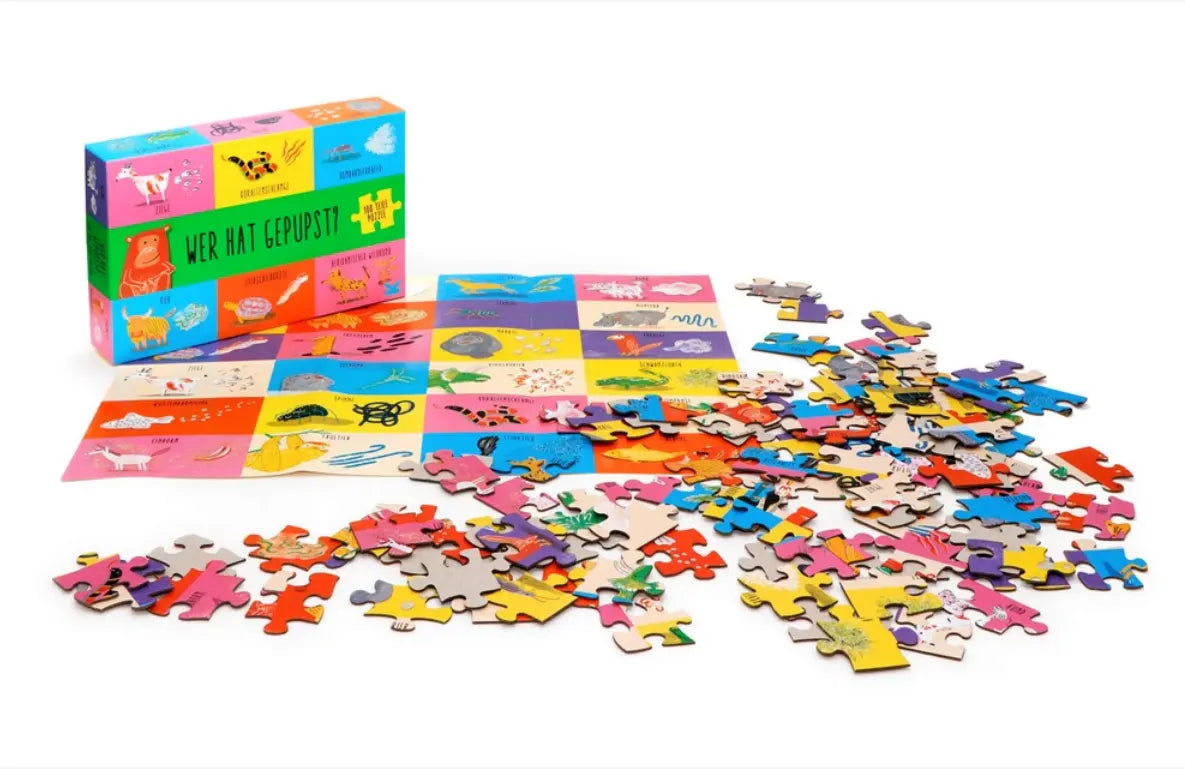 Kartenspiel-Laurence-king-verlag-Wer-hat-gepupst-Ein-100-Teile-Puzzle-verpackung-cover-von-vorn-mit-Inhalt-2