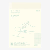 Midori-MD-Notebook-A5-GridBlock_Notizbuch-Cover-Produktansicht-mit-Banderolle