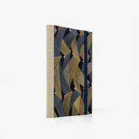 Notizbuch-liniert-A6-Blaupause-144seiten-mit-Chiyogami-cover-bezogen-Motiv-Saitenspiel-schwarz-cover-seitlich-von-hinten