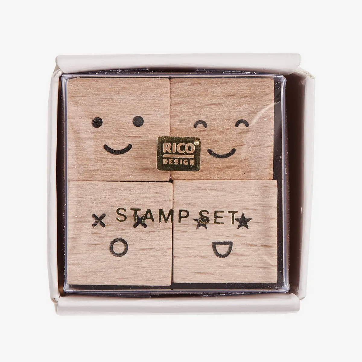 Rico-design-Mini-Stempelset-Smile-3x3x3cm-4Stueck-Produktansicht-in-Verpackung-mit-Deckel