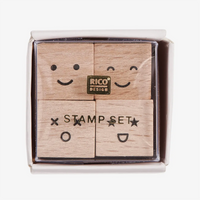 Rico-design-Mini-Stempelset-Smile-3x3x3cm-4Stueck-Produktansicht-in-Verpackung-mit-Deckel