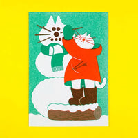Riso-Klapp-grusskarte-mit-Umschlag-Snow-Cat-Weihnachtskarte-Format-A6-Ansicht-auf-gelen-Hintergrund