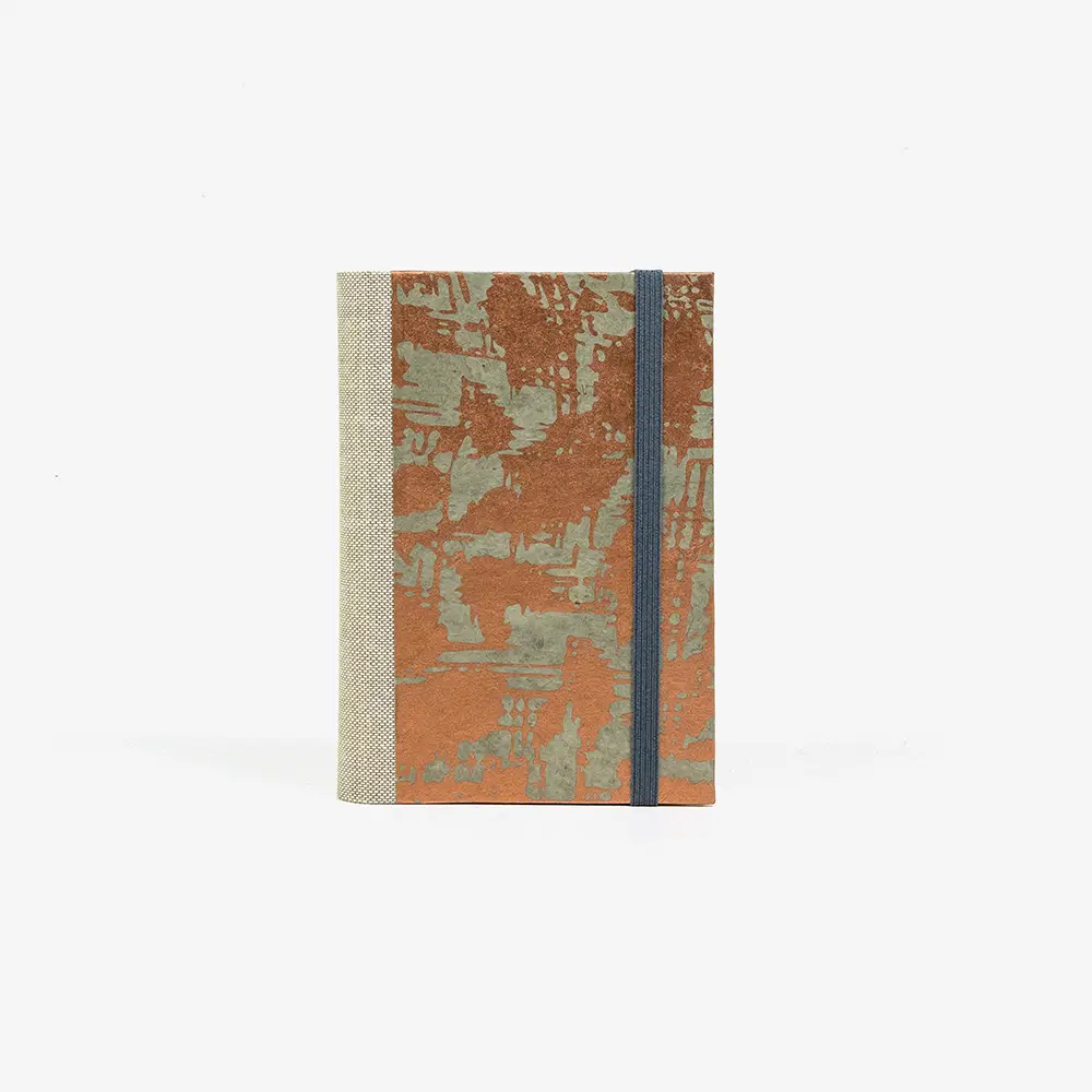 Skizzenbuch-9x14cm-244-Seiten-blanko-Loktapapier-Motiv-abstrakt-Kupfer-auf-Grau-cover-von-vorn