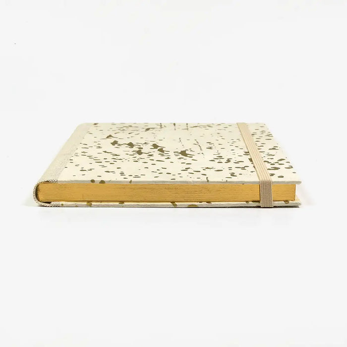 Skizzenbuch-A5-mit-Goldschnitt-cover-Lokta-Papier-160-Seiten-Motiv-Muster-Gold-auf-NAtur-liegend