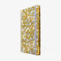 Skizzenbuch-A5-mit-Goldschnitt-cover-bezogen-mit-chiyogami-Papier-160-Seiten-Motiv-Kraniche-gold-kupfer-weiss-auf-grau-seitlich-von-vorrn