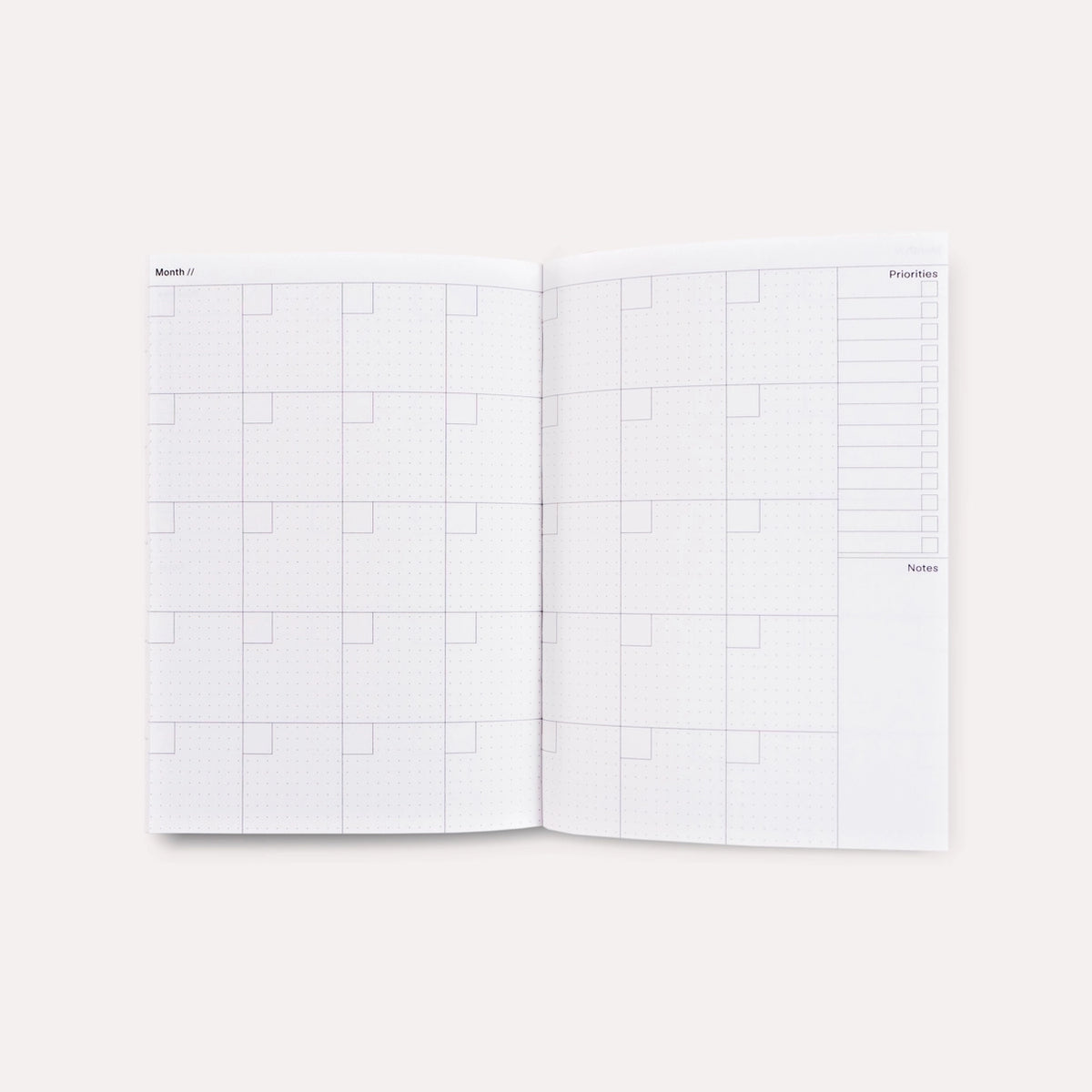 Undatierter-Wochenplaner-NEroli-Pocket-Softcover-A6-128Seiten-Buch-Innenansicht-Monatsuebersicht-1