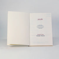 Wochenplaner-A5-2025-erste-Seite-Buch-aufgeschlagen