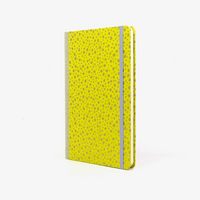 Wochenplaner-Format-A5-cover-Chiyogami-papier-Motiv-golden-Polkadots-auf-auf-neongruengelb-cover-seitlich-von-vorn