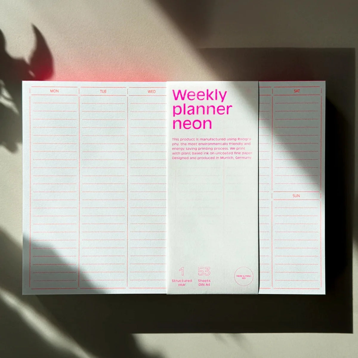 Wochenplaner-neon-non-Herr-und-frau-Rio-A4-Abreisblock-cover-vorn