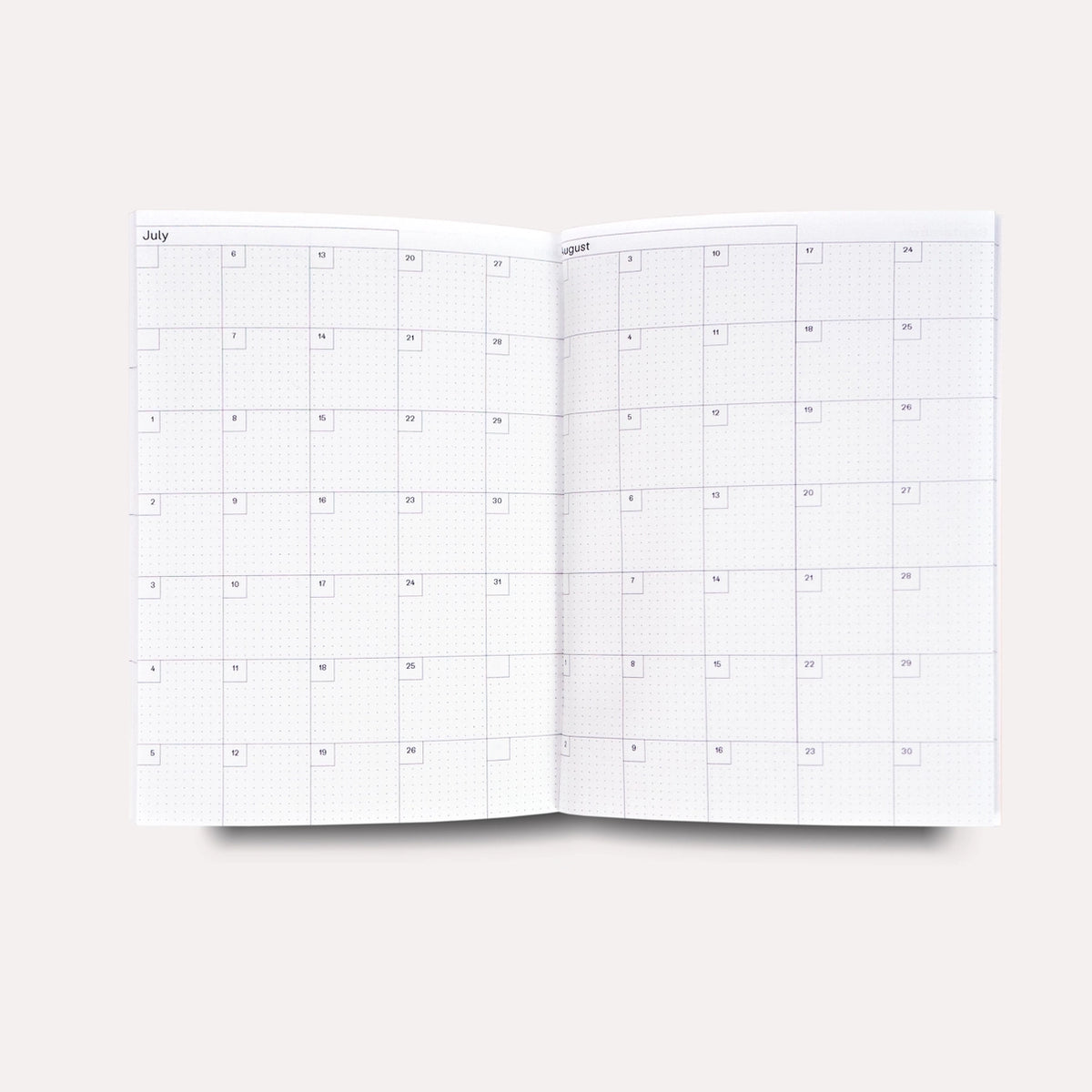 datierter-Wochenplaner-2026-Signal-Softcover-A6-128Seiten-Monatsuebersicht-Buch-aufgeschlagen-Produktansicht-1